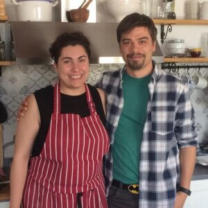 a man and a woman in a kitchen