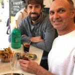 Alex and Steve drinking cava on barcelona food tour