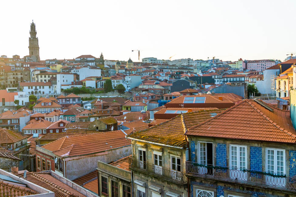 view across the city with orange tile roofs