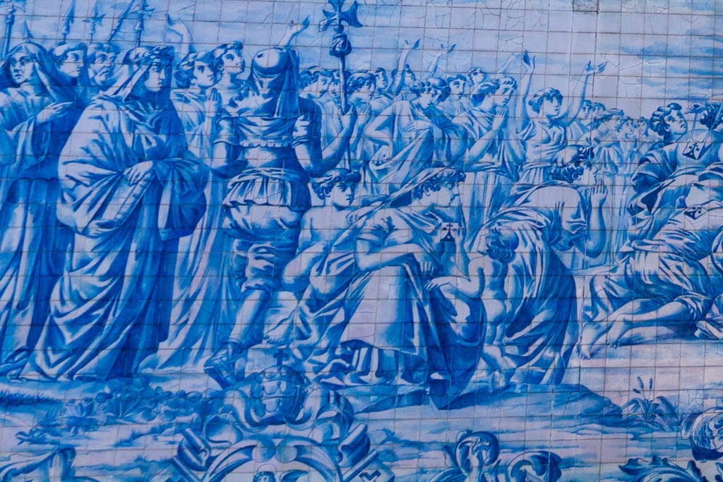 close up of intricate painting on traditional Portugues blue and white tile