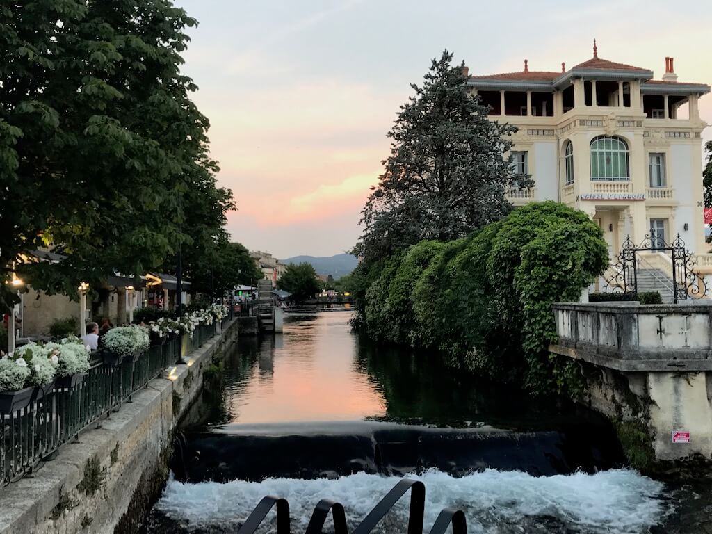 sunset over a river in Isle sur La Soruge