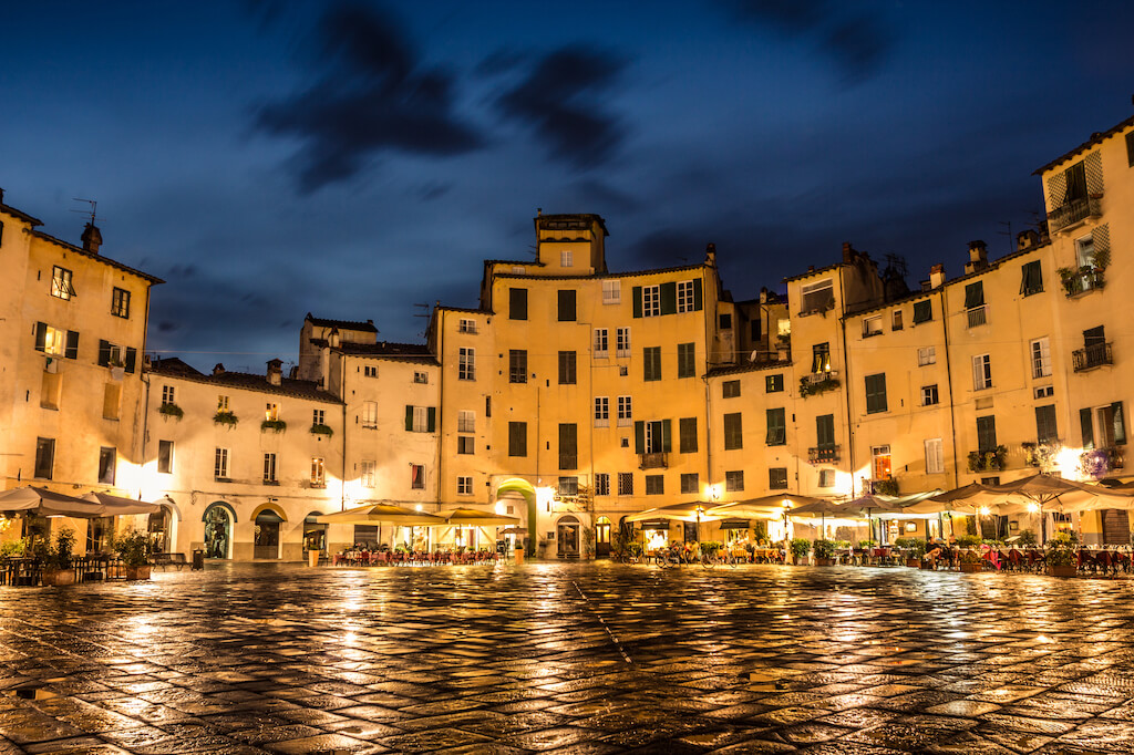 Amphitheater square in Lucca after rain. Tuscany, Italy.
