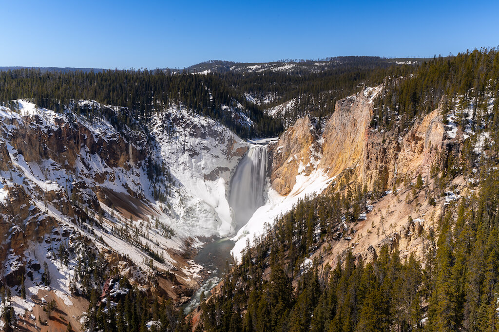 Waterfall at Grand Canyon of the Yellowstone with snow