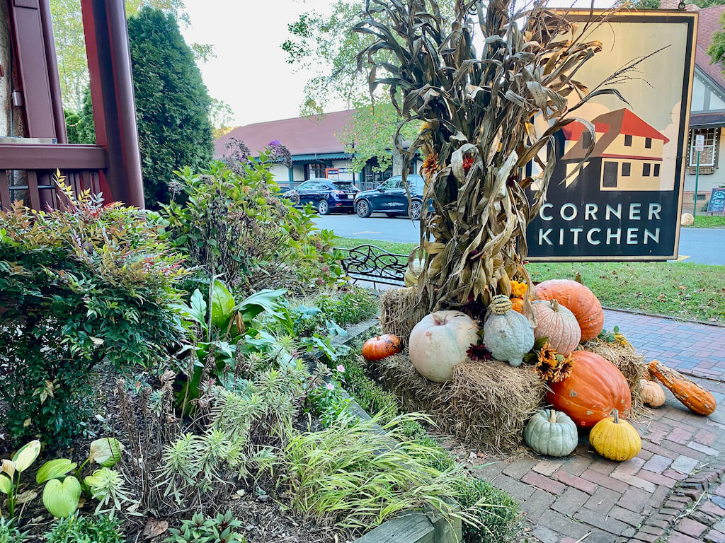 Pumpkins by the sign of Corner Kitchen restaurant