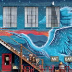 Mural of blue swan taking flight