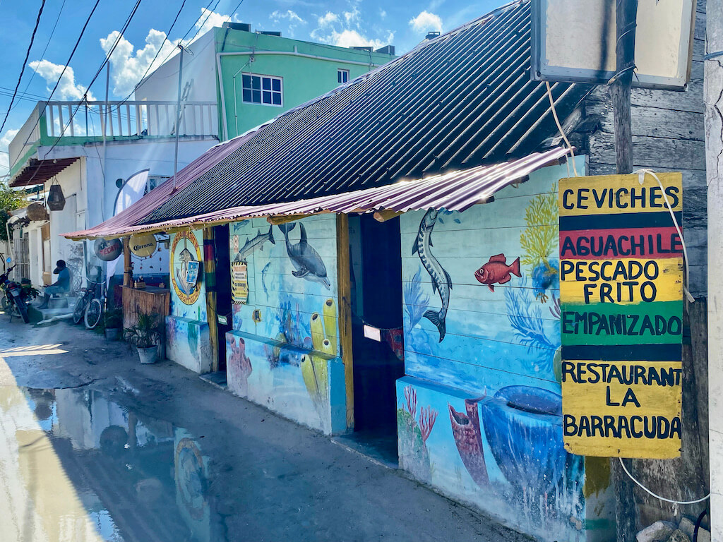 Mural on a restaurant with ceviche sign
