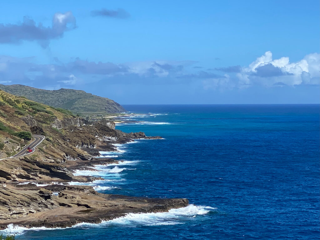 Rocky coast and highway with deep blue ocean
