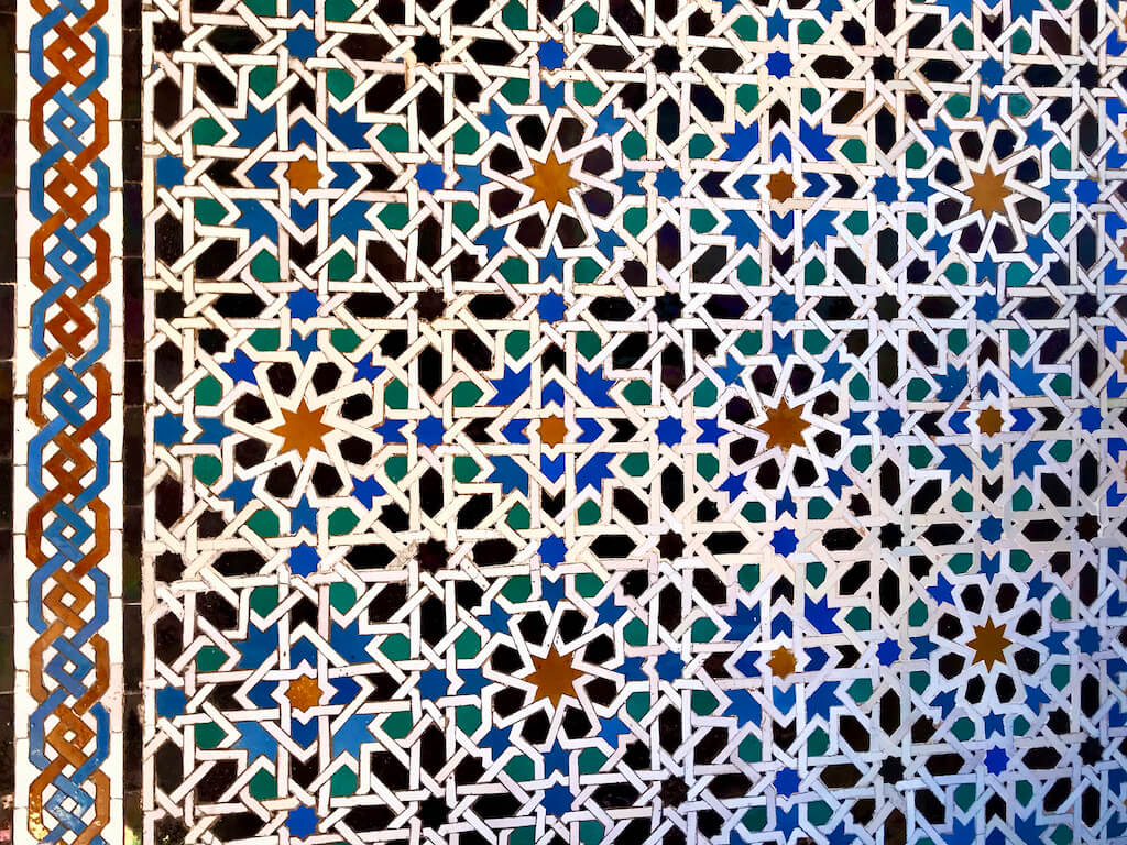 colorful geometric tile wall in the Alcazar
