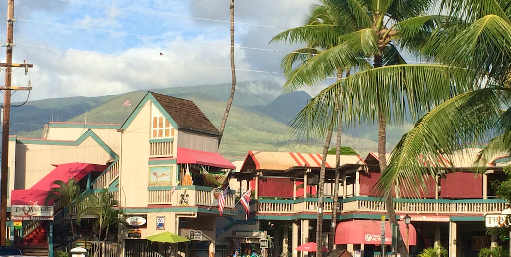 colorful historic shops against the mountains in Lahaina, Maui
