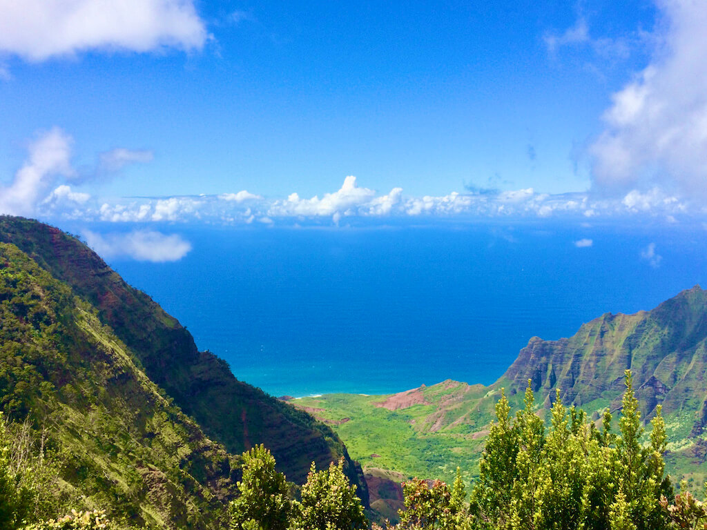 Bright blue Pacific ocean viewpoint on Na Pali Coast, Kauai