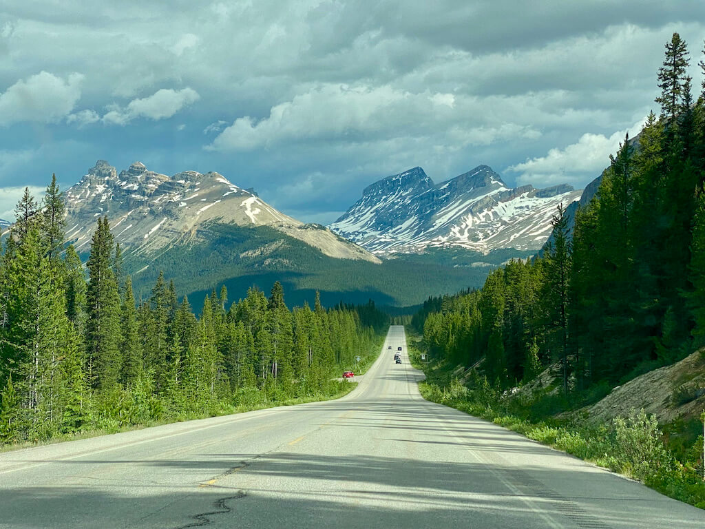 view of the road and mountains on the Icefield Parkway