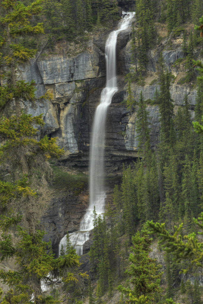 Bridal Veil Falls in Banff National Park, Alberta Canada. Seen along the Icefields Parkway's Big Bend area. The waterfall is 1200 feet high and has a single drop of 400 feet.