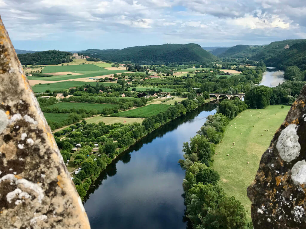 View across the verdant Dordgone valley from turret of Chateau de Beynac