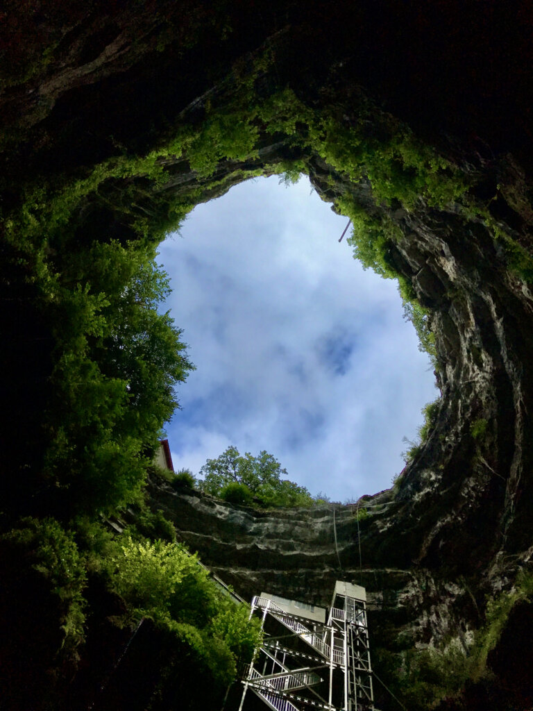 Looking up to the sky from the cave