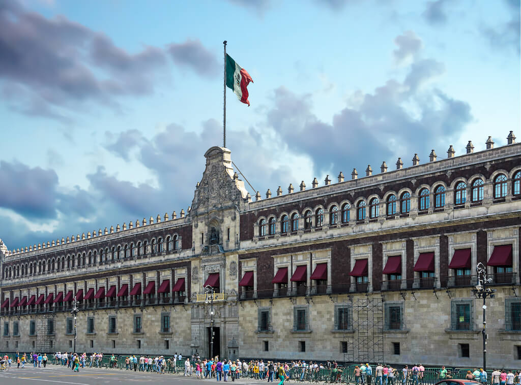 The National Palace facade next to the Zocalo in Mexico City.