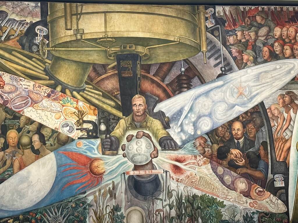 whimsical painting of a man with a machine and wings at Bellas Artes