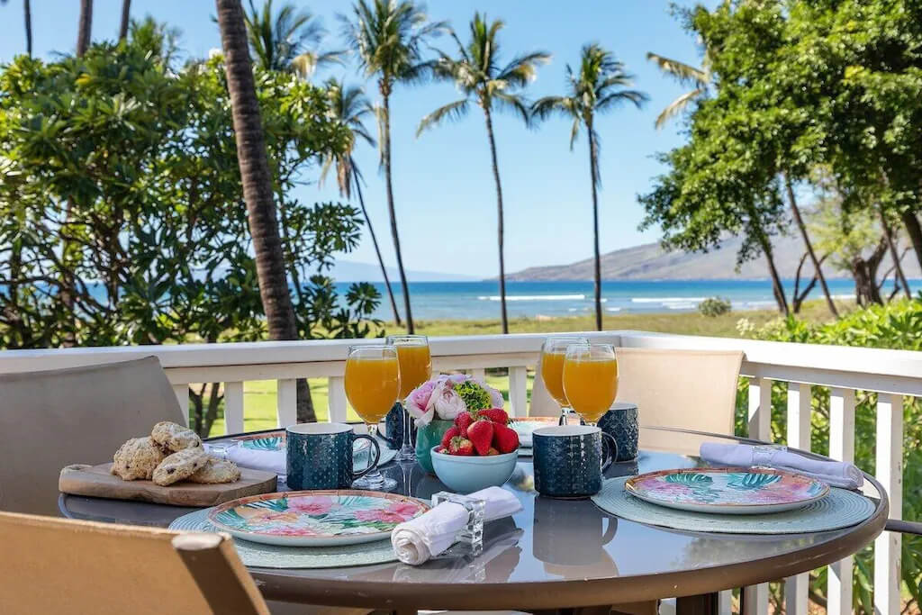 beautiful breakfast table on the deck with ocean view