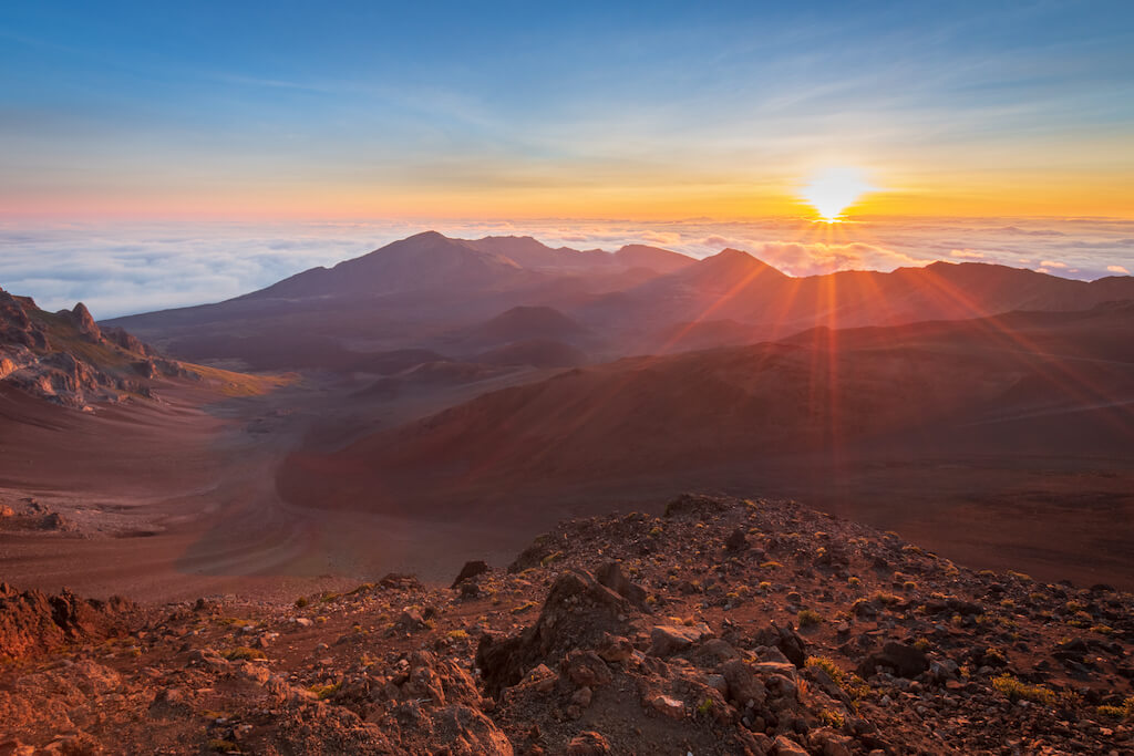 Beautiful and breathtaking sunrise at summit of Haleakala Crater in the National Park on the Hawaiian island of Maui, USA