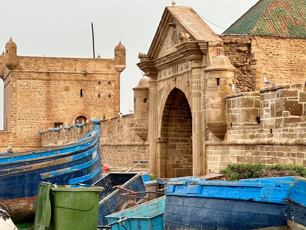 View of stone buildings and boats at Essaouira