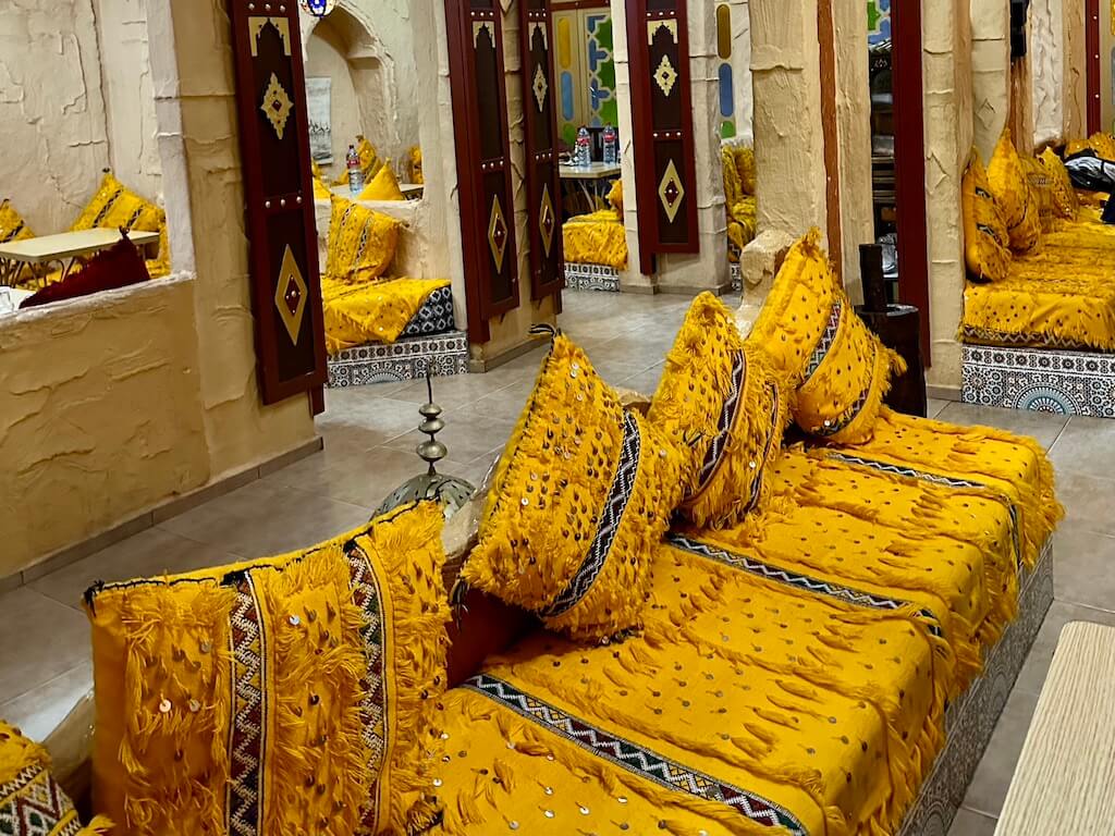bright yellow cushions in a restaurant in Rabat
