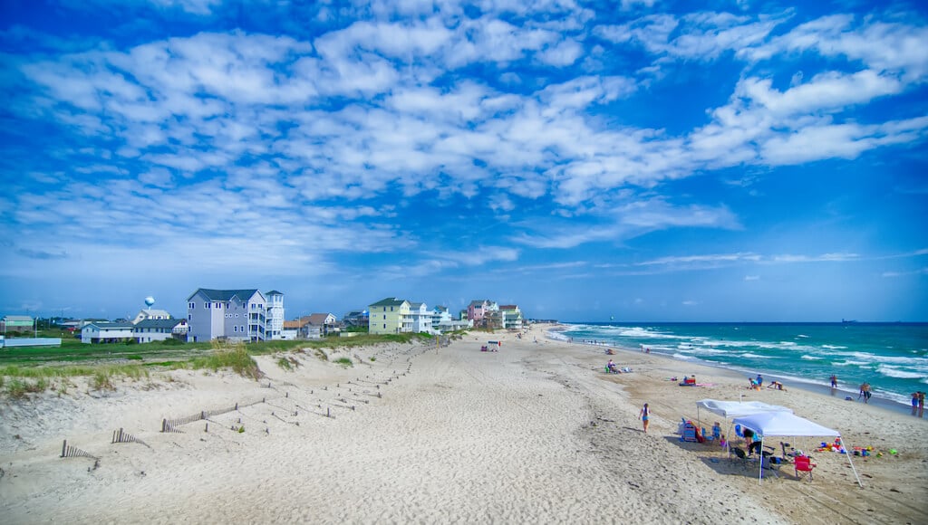 white sandy beach and ocean waves at Outer Banks in North Carolina