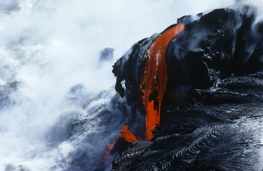 Volcanos National Park, cooling lava and surf