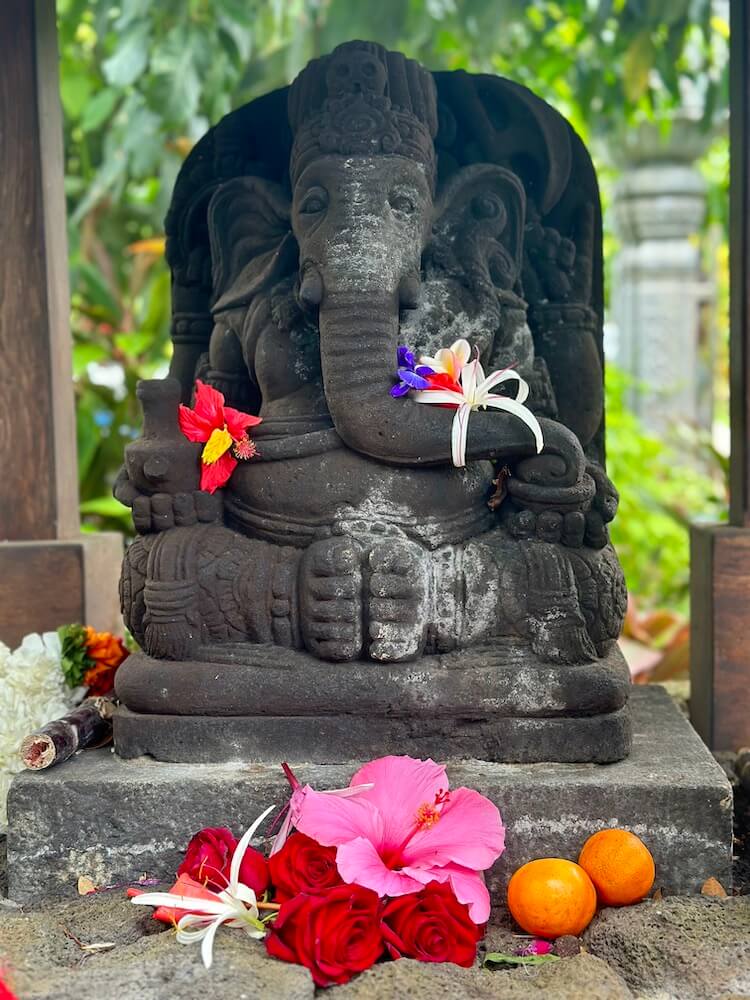 Hindu elephant altar with tropical flowers