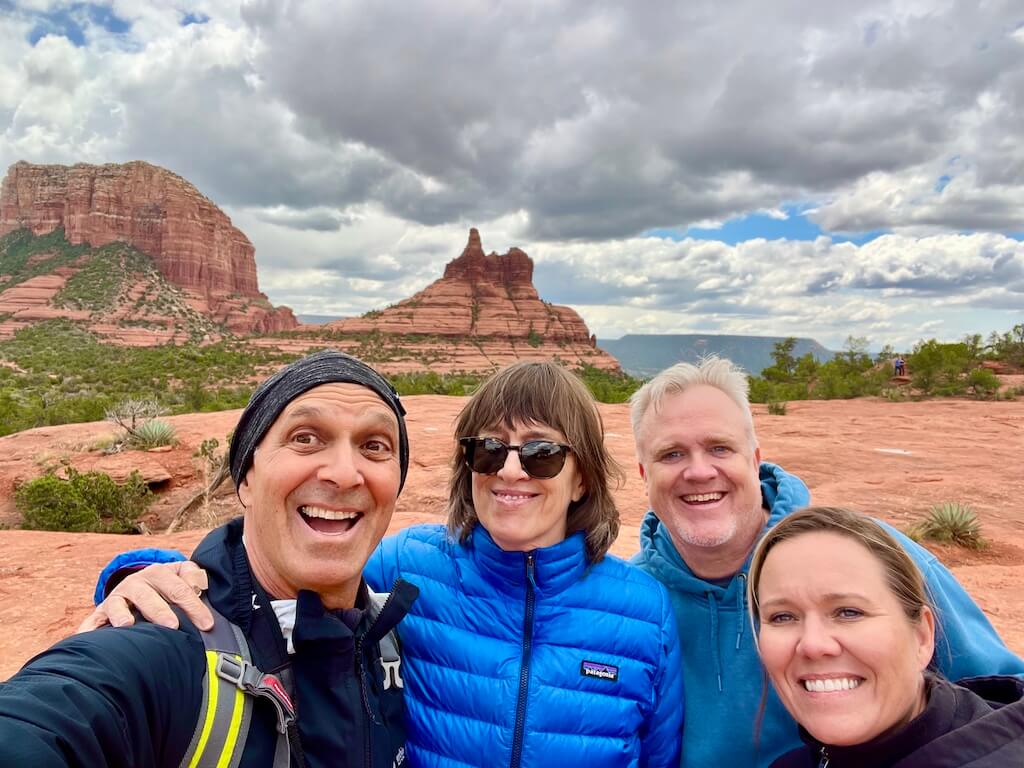 Me, Steve, and family on our Sedona trip with hoodoos in the background